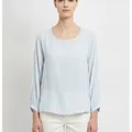 Hadley Blouse in Sky Blue, model shot on white