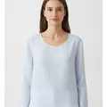 Ellis Blouse in Sky Blue, model shot on white
