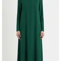 Rowan Midi Dress in Emerald, model shot on white