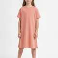 Bramley Kids Day Dress in Coral, model shot on white