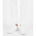 Dunley Everyday Trainer in White, model shot on white
