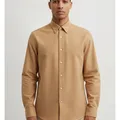 Aster Oxford Shirt in Stone, model shot on white