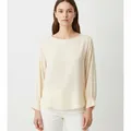 Calder Blouse in Ivory, model shot on white