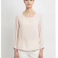 Hadley Blouse in Soft Pink, model shot on white