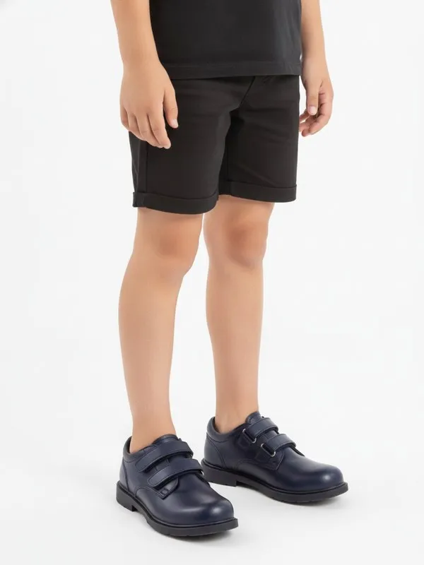 Norwood Kids School Shoe in Navy, model shot on white