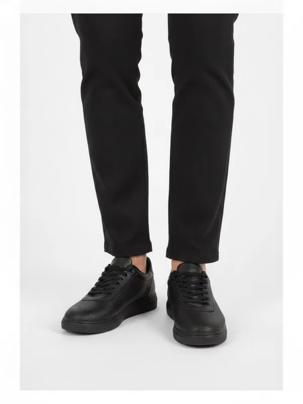 Dunley Everyday Trainer in Black, model shot on white