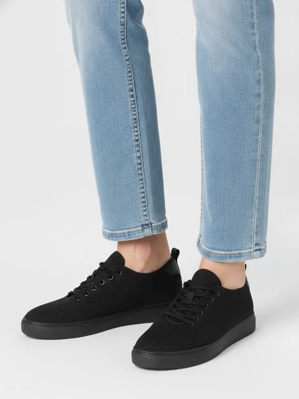 Juniper Everyday Trainer in Black, model shot on white