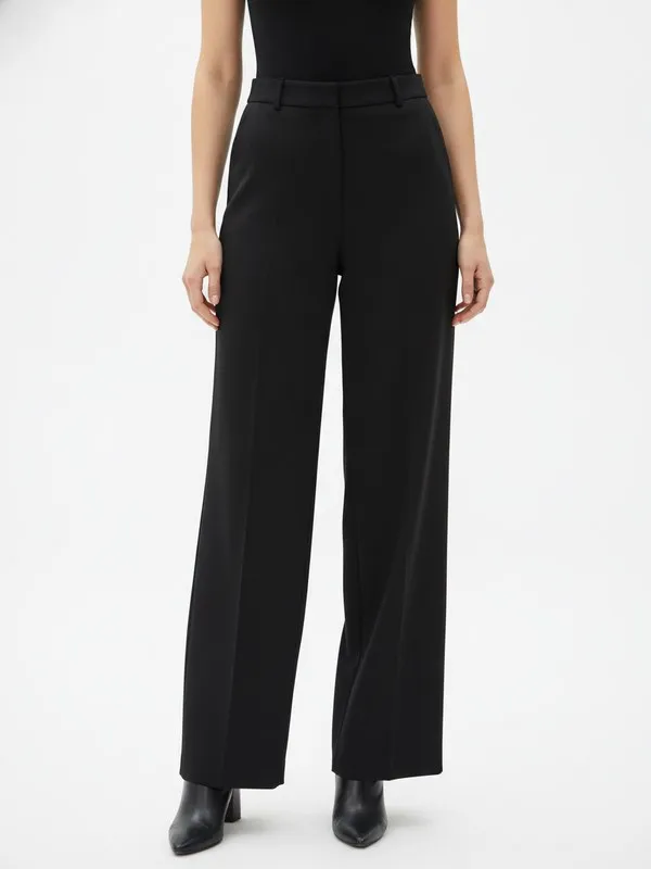 Juniper Wide Leg Trouser in Black, model shot on white