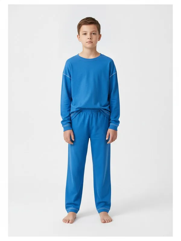Aster Kids Pyjama Set in Blue, model shot on white