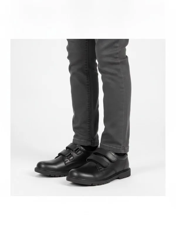 Pimlico Kids School Shoe in Black, model shot on white