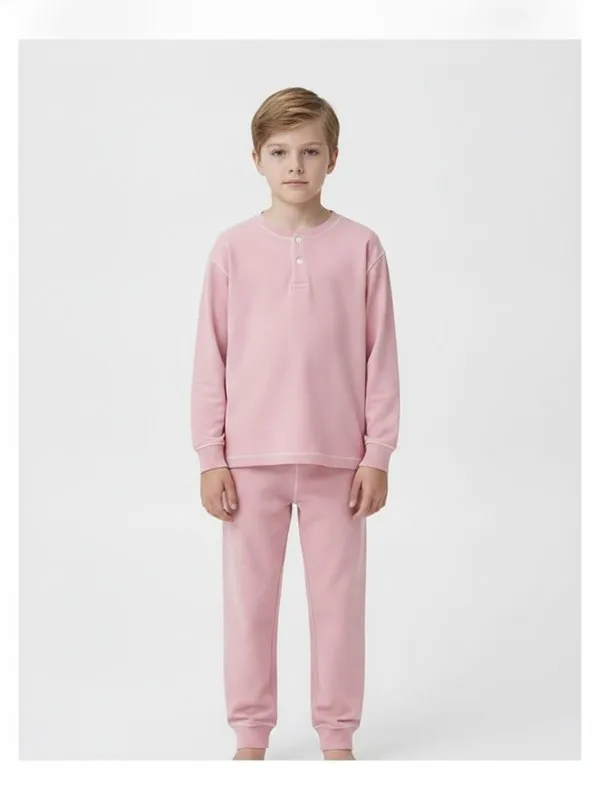 Wycliffe Kids Pyjama Set in Pink, model shot on white