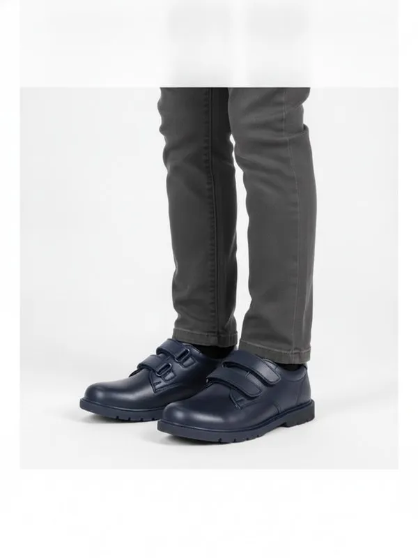 Pimlico Kids School Shoe in Navy, model shot on white