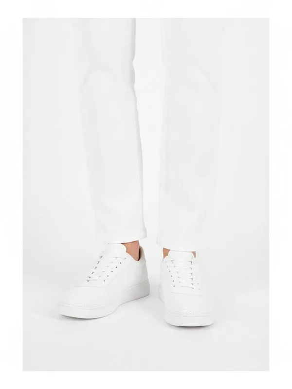 Dunley Everyday Trainer in White, model shot on white