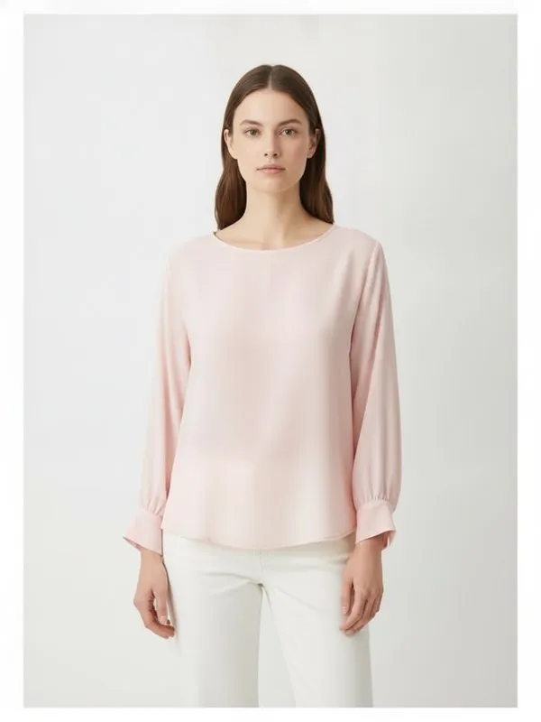 Calder Blouse in Soft Pink, model shot on white