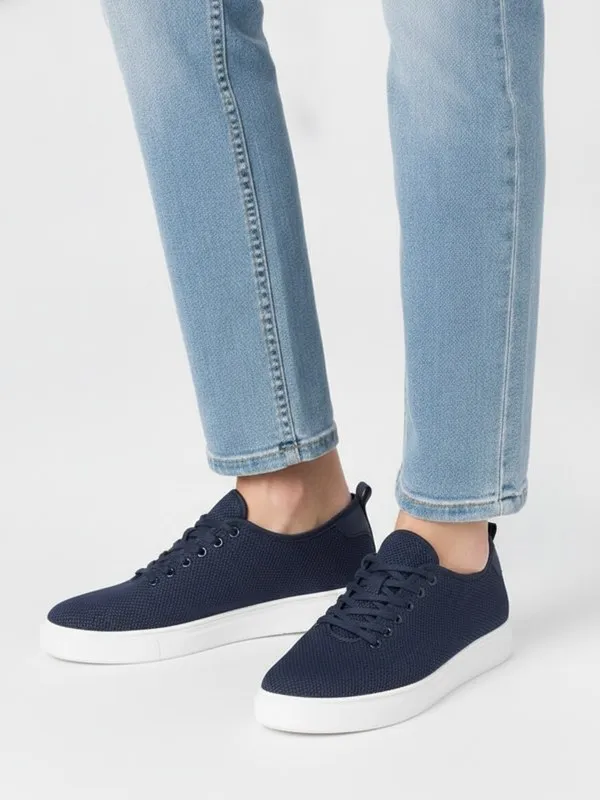 Juniper Everyday Trainer in Navy, model shot on white