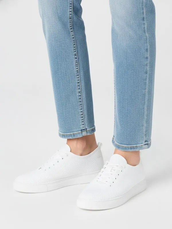 Juniper Everyday Trainer in White, model shot on white