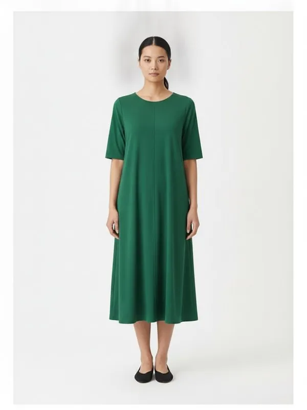 Tarn Midi Dress in Emerald, model shot on white