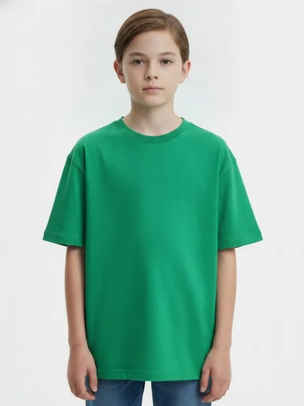 Quarry Kids Graphic Tee in Green, model shot on white