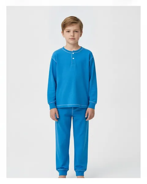 Wycliffe Kids Pyjama Set in Blue, model shot on white